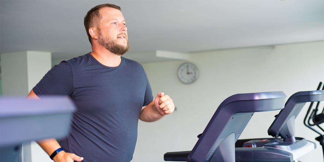 man running on treadmill
