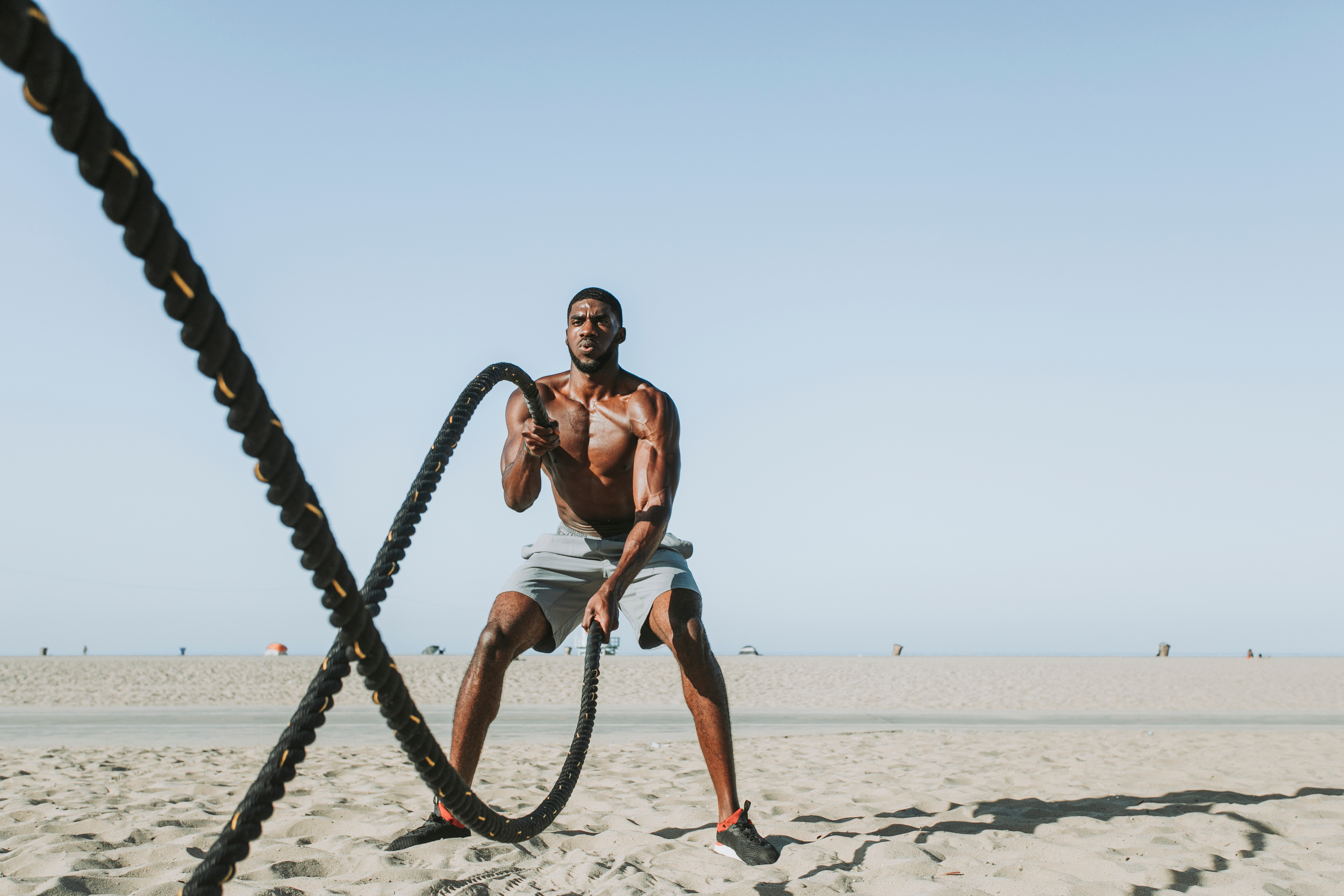 Man Working Out On The Beach